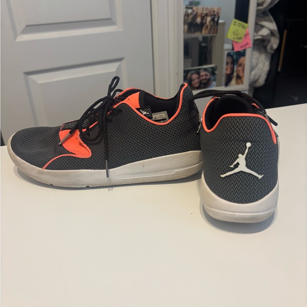 Jordan Black and Neon Orange Athletic Shoes